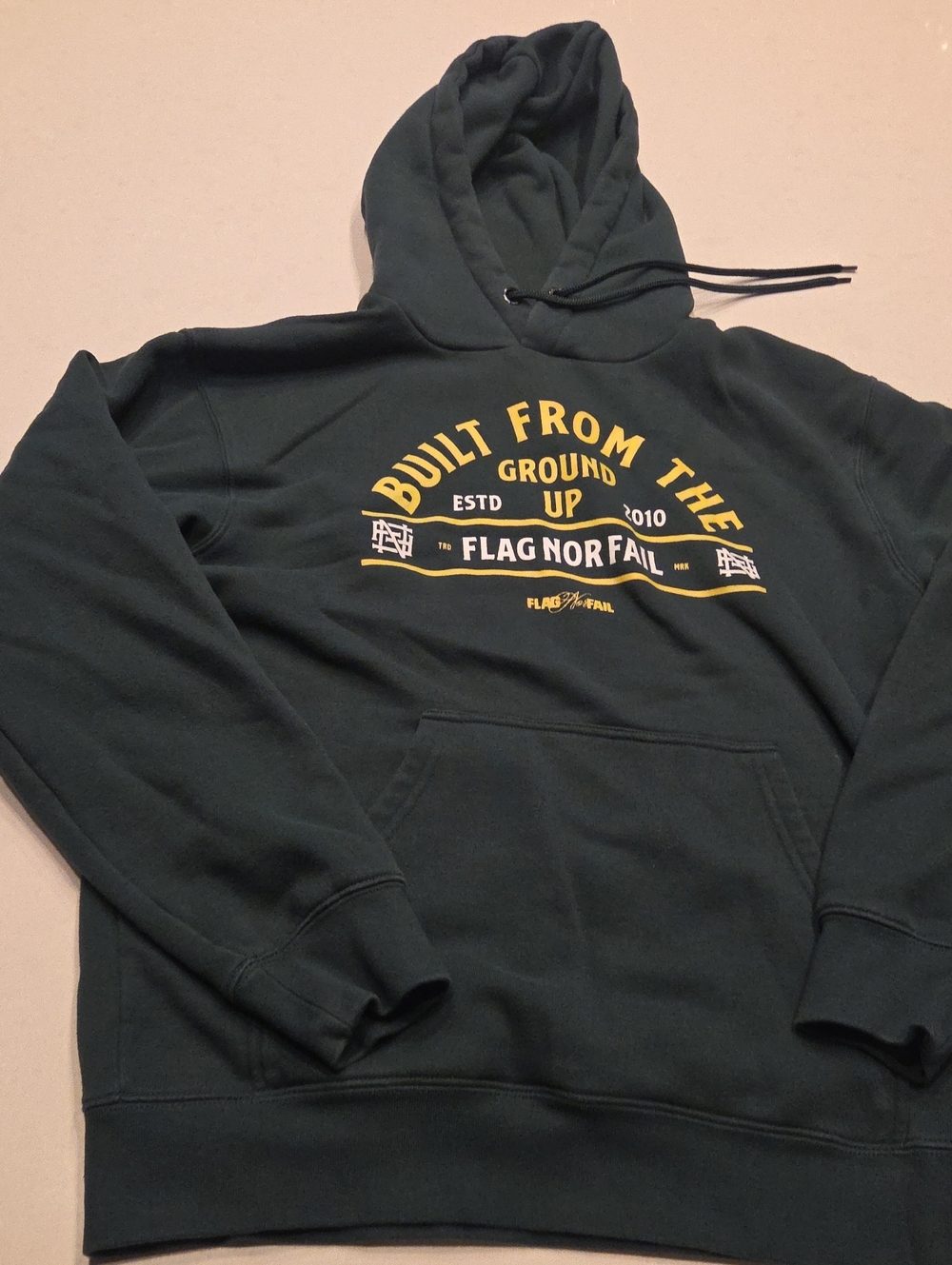flag nor fail Dark Green Hoodie with Yellow Graphic